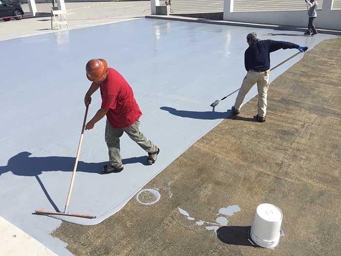 Roof slab crack repair and waterproof coating application by professional contractor